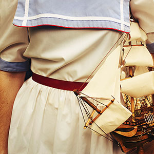 Holding Toy Ship